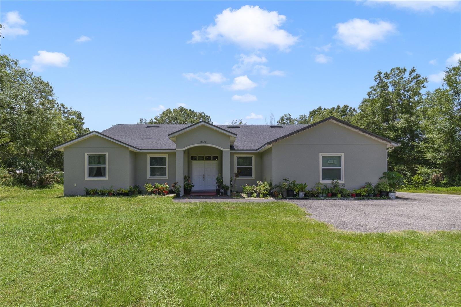 This property isn’t just a home it’s a canvas for your lifestyle and vision. Zoned A-2 Farmland Rural, it offers flexibility and open space that most city lots can’t provide.
ENDLESS POSSIBILITIES... Add a guest house, tiny home, or another in-law suite. Raise chickens, goats, or horses. Plant fruit trees or grow your own garden. Create walking trails, ATV paths, or even a koi pond or fishing spot.
INCOME & LIFESTYLE OPTIONS... Build a barn or workshop, add RV or boat storage, or explore agri-tourism ideas like a pumpkin patch, sunflower field, or “pick-your-own” orchard. Host events, create an artist studio, or design a private retreat with outdoor living spaces.
With its generous zoning and extra land, this property gives you the freedom to design the lifestyle you want, whether that’s generating income, enjoying the outdoors, or simply creating your own private escape. Don’t just buy a home, buy a lifestyle with possibilities.
Yes, you read that right, your new home sits on 2.36 acres with NO HOA! This spacious 5BR/3BA property offers privacy, flexibility, and location. The main home features 3BR/2BA, a large entryway, family room, dining space, and a split floor plan with private master suite. The attached in-law suite has its own entrance, 2BR/1BA, plus kitchen and living area, perfect for guests or multigenerational living. Outside, enjoy endless possibilities on the land: add a guest house, barn, workshop, garden, or stables, raise animals, host events, or create a private retreat. Minutes from Waterford Lakes shopping and dining, yet tucked away for a true country feel in the city.