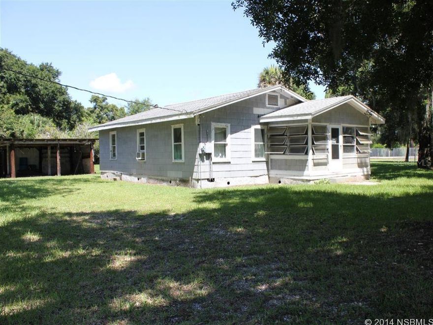 Investor Alert! Older home needs TLC on beautiful corner lot with mature canopy of trees. Property also includes Parcel #950505000060.