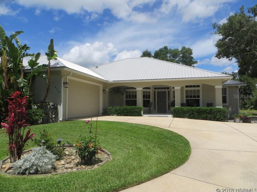 This well kept home is nestled at the end of a cul-de-sac in the Woodlands subdivision of Sugar Mill County Club. The new deck made of Brazilian hardwood looks out onto a peaceful, quiet and an eye pleasing view of the woodlands. Well maintained and beautifully landscaped. The two bedroom home with a den is spacious, bright and open. There's a formal dining room, separate breakfast nook and  fireplace. The home has 2 full baths in each bedroom and half bath off of the living area. The master bedroom is large and has a sitting area with new sliding glass doors looking out onto the back deck. The kitchen is fully equipped with gas stove, granite countertops, tiled backsplash with a walk in pantry. There is a separate laundry area with plenty of storage and a gas hot water heater.  New ceiling fans and light fixtures. The home is immaculately kept. Partially floored attic. This is a custom built Hickson home. Oversized double car garage. Measurements of rooms are approximate. ;Water: City