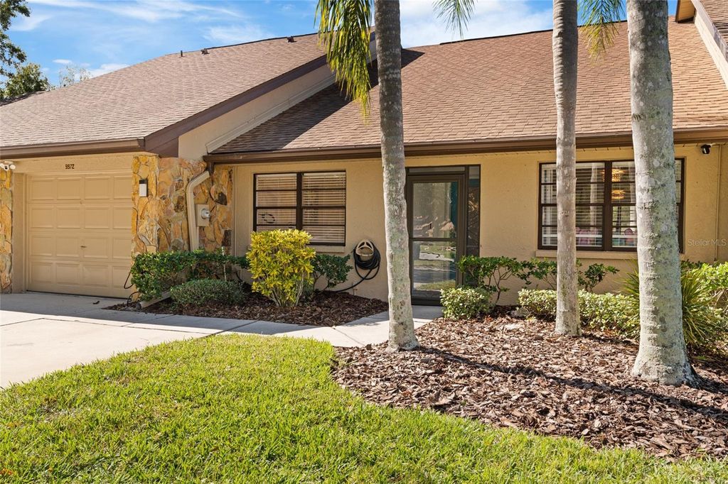 Photo of 9972 Lake Seminole Drive W, Largo, FL 33773 (MLS # TB8448132)