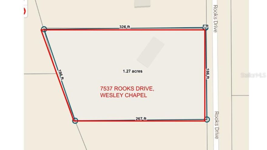 Value is in the land. LOCATION, LOCATION, LOCATION. Prime real estate over one acre. No HOA, No CDD. Build your home, store your RV. Great location in Wesley Chapel. Close to I-75.