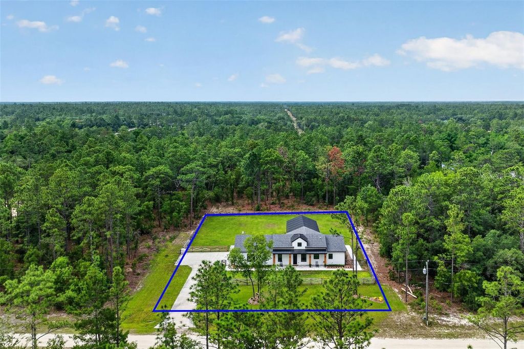 Photo of 12552 SW 78th Place, Dunnellon, FL 34432 (MLS # O6407833)