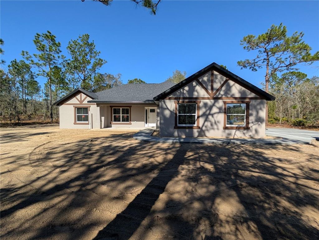 Photo of 12504 SW 78th Place, Dunnellon, FL 34432 (MLS # OM720421)