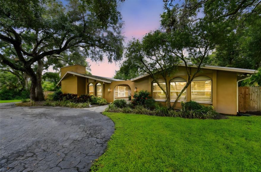 Introducing a remarkable luxury estate in the prestigious Belleair Road location, situated on an expansive ¾ acre lot. This exquisite Clearwater home offers an elegant yet witty charm, making it an exceptional choice for both family living and investment opportunities. Step inside to discover over 4,651 square feet of well-appointed living space featuring five spacious bedrooms and four and a half bathrooms. Two magnificent master suites provide peaceful retreats, while a generous in-law suite with a private balcony and separate entrance adds versatile living options. The open floor plan invites effortless entertaining, seamlessly connecting indoor and outdoor spaces. The remodeled saltwater pool, complete with a screened enclosure and PebbleTech finish, serves as the centerpiece of this outdoor oasis. The newly re-screened pool cage allows for uninterrupted enjoyment of the Florida sunshine. Relish in the pool views from the comfort of your private outdoor space, or take a refreshing dip in your private pool. Designed for both relaxation and recreation, this estate includes a dedicated arcade/game room and ample parking for all your vehicles and recreational toys—thanks to the 2-car garage, 3-car carport, and additional parking for jet skis or motorcycles. Modern smart technology complements the home’s luxury, with Honeywell thermostats, smart locks, Arlo security cameras, and a smart garage system ensuring both convenience and security. Recent upgrades highlight the home's impeccable maintenance, including a new roof (2020), HVAC updated with smart thermostats (2022), new water heater (2021), and freshly installed gutters and front fence (2025). The estate boasts a strong Airbnb income history with over $285k in gross bookings over the past three years, showcasing its investment potential. Previously owned by world champion boxer Keith Thurman Jr., this property offers a unique blend of prestige, comfort, and modern sophistication. Just minutes away from Clearwater Beach, Belleair Beach, and vibrant downtown areas, this highly desirable neighborhood offers no rental restrictions, ensuring both freedom and flexibility. Embrace luxury living in one of Tampa Bay’s most sought-after neighborhoods, where elegance meets opportunity. Welcome home to your prestigious Belleair Road estate.
