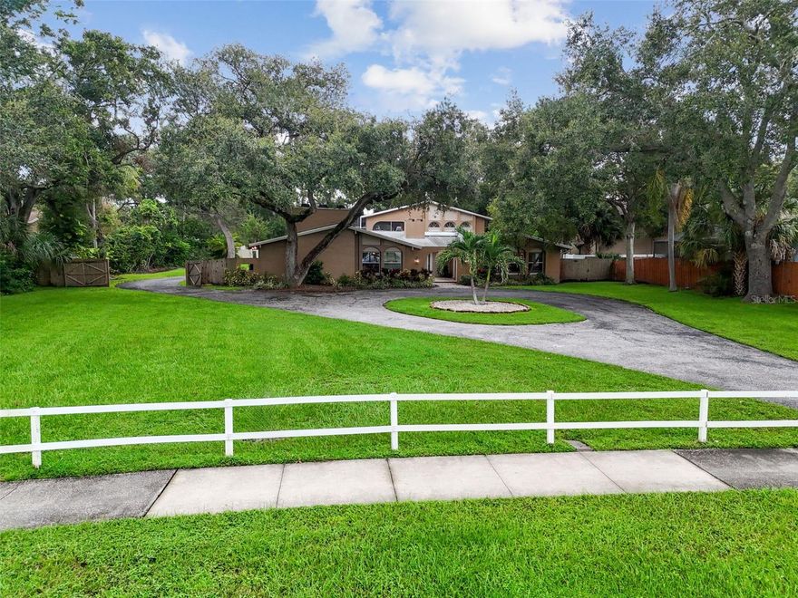 Opportunities like this are increasingly rare in Clearwater. Situated on a private ¾-acre lot, this 4,651 sq ft, 5-bedroom, 5-bath residence offers exceptional space, flexibility, and long-term value—just minutes from Belleair, Clearwater Beach, and major commuter routes.

The home features a grand, functional layout with multiple living and entertaining areas, ideal for large households, multigenerational living, or buyers seeking room to work, host, and grow. While the kitchen and baths retain a classic style, the property has been thoughtfully maintained with major capital improvements already completed, allowing buyers to focus on personalization rather than infrastructure.

Recent upgrades include a 2020 roof, 2022 HVAC, new gutters (2025), and a fully remodeled saltwater pool completed in 2020 featuring PebbleTec finish, new pump equipment, pool heater, and a newly rescreened pool cage (2025)—creating a true private retreat for year-round enjoyment.

An oversized 3-car garage, expansive grounds, and setback placement provide rare utility and privacy, with ample room for recreational vehicles, boats, workshops, or future outdoor enhancements. The home is also fully smart-home enabled, including smart locks and smart lighting throughout, offering modern convenience at scale.

Comparable interior-street homes with similar square footage and lot size command significantly higher prices, making this a compelling opportunity for buyers seeking estate-level space without the premium. This is an ideal property for discerning buyers who value size, land, systems, and location—while customizing finishes to taste.

Priced to reflect location and condition. Seller open to incentives and flexible terms.
Schedule your private showing to experience the scale, setting, and potential this home delivers.