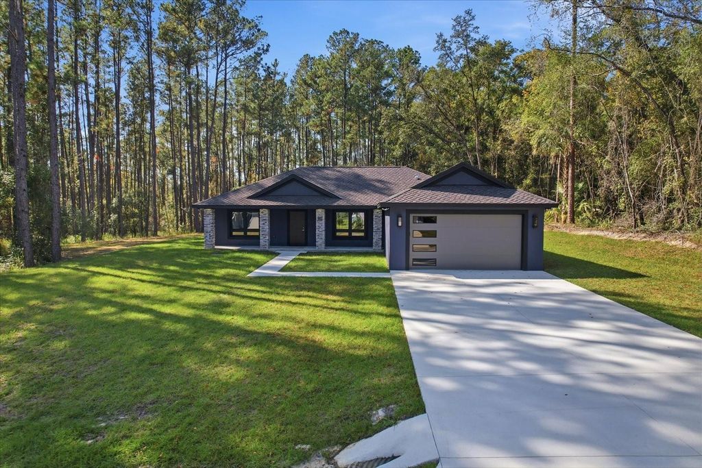 Photo of 9802 N Athenia Drive, Citrus Springs, FL 34434 (MLS # G5104759)