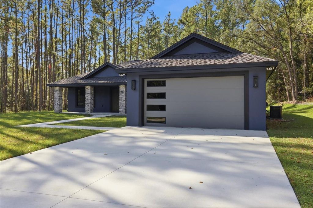 Photo of 9802 N Athenia Drive, Citrus Springs, FL 34434 (MLS # G5104759)