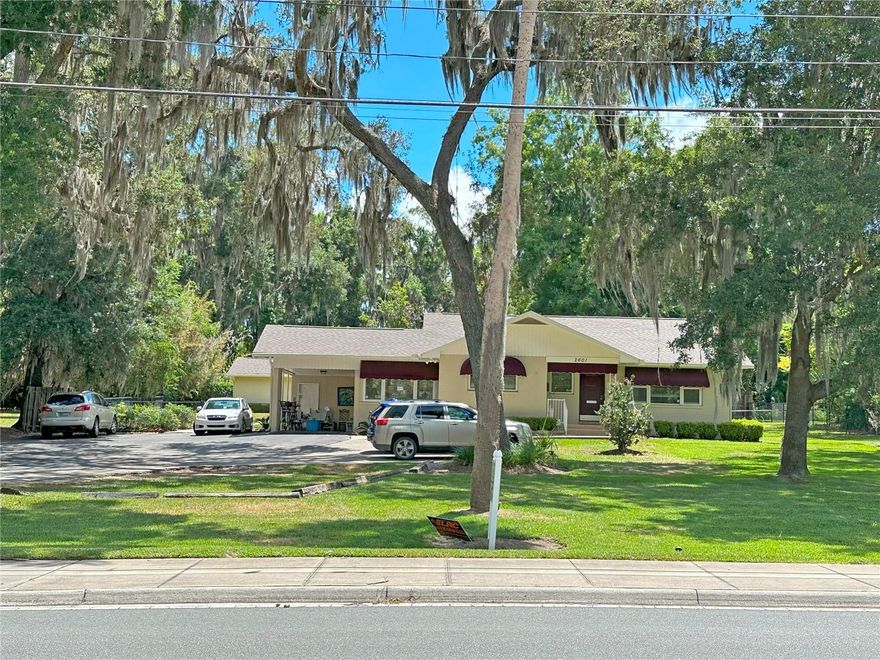 Great Office Space located in the Heart of Ocala. Two separate buildings. Occupy one and rent the other. Front building has great visibility on Lake Weir Ave. The front building offers a large waiting room 3 offices, a conference room, a breakroom and a quite sitting area outside. The second building is great for a studio/training room Boasting a large workspace and two offices.  Both buildings have new roofs in 2024 and updated HVAC units. The large lot with beautiful oak trees gives a serene work space. The landscaping is currently being updated. Owner is willing to finance to a qualified buyer.