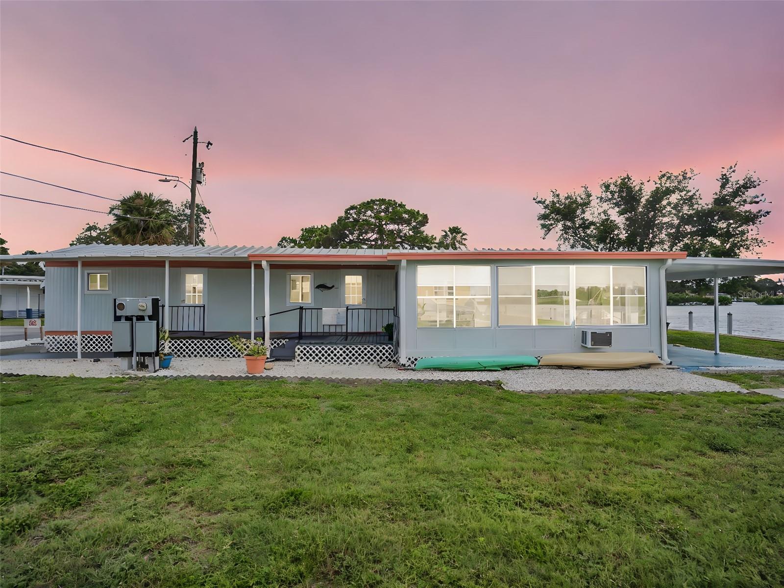 Waterfront 2 Bedroom/2 Bath with SPECTACULAR SUNSET VIEWS – Gulf Access! BOAT SLIP INCLUDED!
Welcome to your slice of paradise in the highly sought-after 55+ community of Chesapeake Point Co-Op, nestled between Tarpon Bayou and Kreamer Bayou in beautiful Tarpon Springs. An excellent opportunity for seasonal living, peaceful retirement, or transforming into your own private fishing getaway. This charming 2-bedroom, 2-bathroom waterfront home offers unbeatable views, DIRECT GULF ACCESS, and a vibrant coastal lifestyle.
This 12’ x 56’ mobile home includes a spacious 10’ x 21’ sunroom and an 11’ x 22’ waterside lanai—perfect for enjoying breathtaking sunsets, cocktails with friends, and watching dolphins and manatees glide by. Fish for snook, redfish, and trout right from the community docks, or hop into your boat at your private slip and head out to Anclote Island, Three Rooker Island, or the Sponge Docks just a half mile away.
Recently renovated following Hurricane Helene in 2024, the home features a refreshed bathroom with a new drop-in shower and vanity, and updated kitchen appliances for your convenience. Whether you’re looking for a full-time residence or a seasonal escape, this home is move-in ready.
Chesapeake Point is a hidden gem offering a warm, social atmosphere with frequent, fun gatherings including the Bayou Bash with DJ and Super Bowl Party, a traveling golf fellowship, a clubhouse with art and card games, and shuffleboard right outside your door. Kayak from the private launch over to the Sponge Docks or spend the day at nearby Fred Howard Park or Sunset Beach.
Your purchase includes co-op shares in Chesapeake Point Co-Op, Inc., making this not just a home but a smart investment in one of Tarpon Springs’ most treasured communities. 2 Kayaks and furniture in home can remain.
Enjoy sunsets nightly from your back patio or lanai.
Don't miss this rare opportunity for affordable Gulf-access waterfront living. Schedule your private showing today—this one won't last!