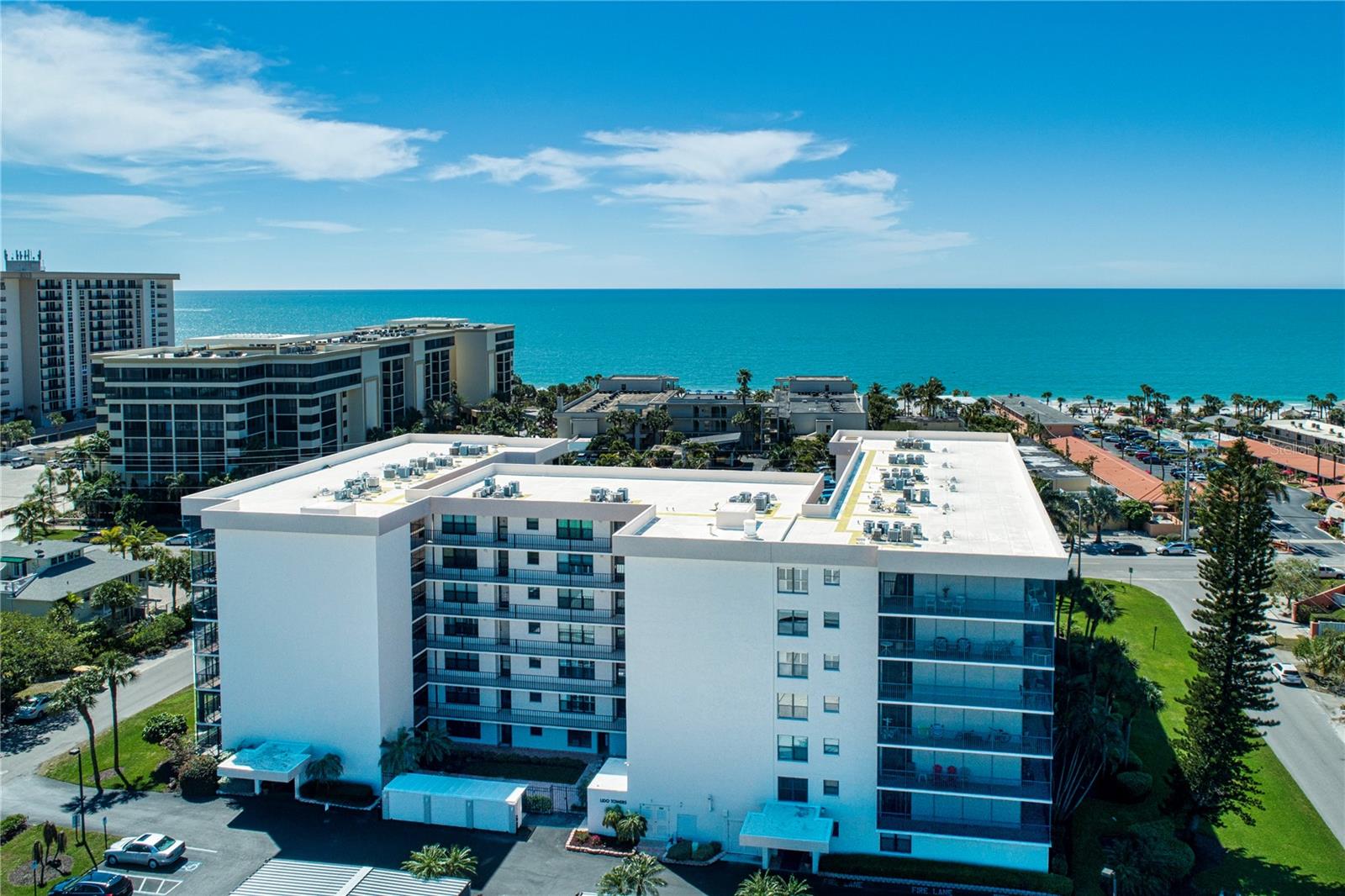THIS CONDO HAS IT ALL!! Lovely updated corner unit with wrap-around lanai - perfect for relaxing after a day at the beach and catching those gentle gulf breezes... This unit has sustained NO damage from the 2024 active hurricane season. Although a first floor unit, no water intrusion into this home! So enjoy the convenience of first floor living -- no elevators, close to the pool, a lanai door that is just steps from the private beach access--- and leave your worries behind! This charming residence has been meticulously maintained. Lido Key is Sarasota's premiere location. Fabulous crystal sand beaches and just steps away from St. Armand's Circle with it's fine array of restaurants and shops. Or jump in the car and head downtown to the theater, ballet or any of the cultural events that are frequently taking place in the city! Heated pool and sauna, small pets are welcome, in house rental program, barbecue and social room. Great rental -- booked until April 15, 2025!