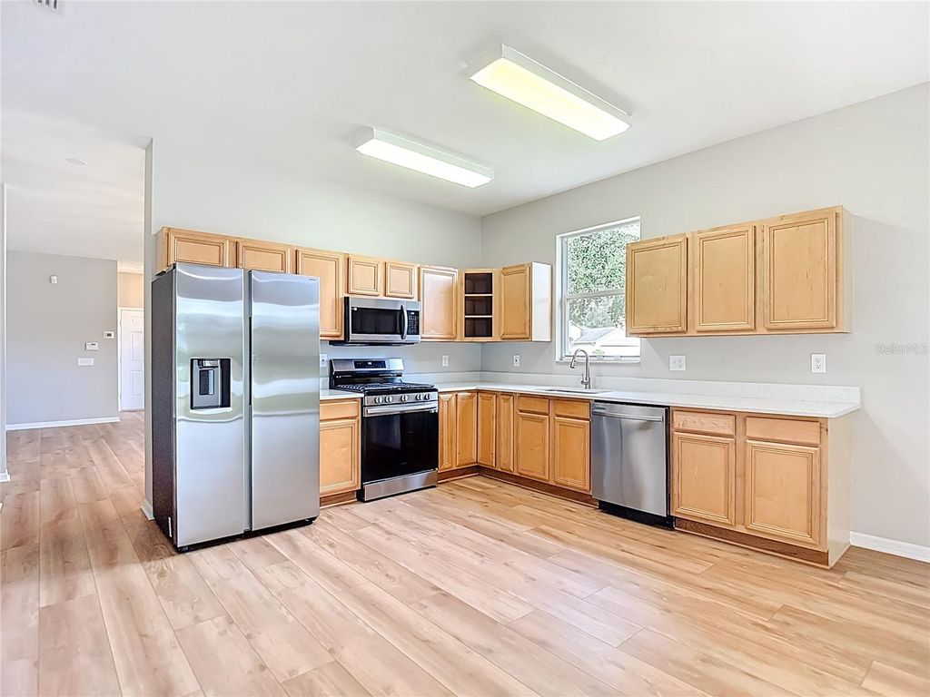 Photo of 4908 Windingbrook Trail, Wesley Chapel, FL 33544 (MLS # TB8433358)