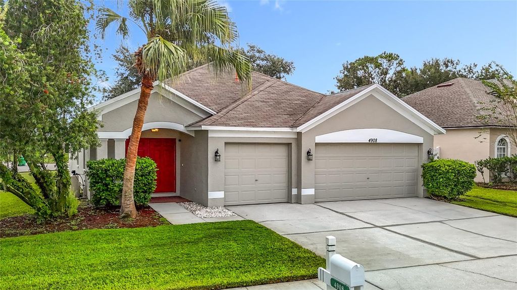 Photo of 4908 Windingbrook Trail, Wesley Chapel, FL 33544 (MLS # TB8433358)