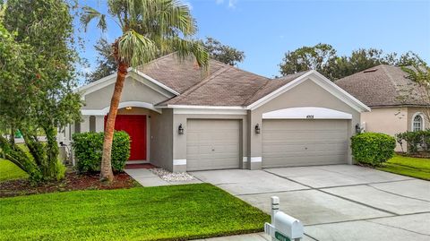 Photo of 4908 Windingbrook Trail, Wesley Chapel, FL 33544 (MLS # TB8433358)