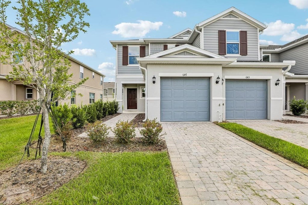 Photo of 647 Meadows Edge Place, Lake Wales, FL 33859 (MLS # O6443305)