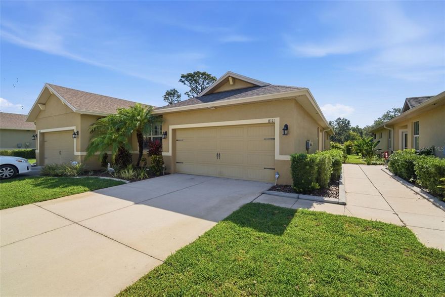 NOTHING HERE WILL DISAPPOINT!  ONLY 24 HOMES IN THIS IMMACULATE ENCLAVE, AND THIS ONE’S THE STAR!
SHOWSTOPPING, STONE-ACCENTED  KITCHEN WITH BREAKFAST BAR, INDULGENT MASTER SUITE WITH LOADS OF STORAGE AND LOVELY GRANITE BATH WITH SOAKING TUB AND WALK -IN SHOWER, QUIET VAULTED SCREENED LANAI, SEPARATE BEDROOM WING WITH PRACTICAL OFFICE NOOK, LARGE, INVITING DEN WITH MURPHY BED DOES DOUBLE DUTY AS GUEST ROOM,  FLOWS NICELY TO LARGE, BRIGHT LIVING/DINING AREA.  EVEN THE GARAGE IS A SHOWPLACE WITH EPOXY FLOORS AND CALIFORNIA CLOSET STORAGE.  EXTREMELY WELL PRICED TO MOVE. A MUST SEE!