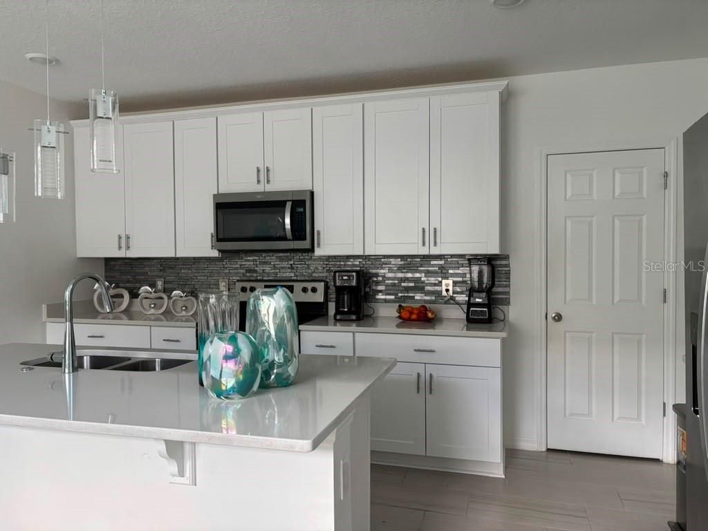 Photo of 1446 Sea Glass Road, Haines City, FL 33844 (MLS # TB8531917)
