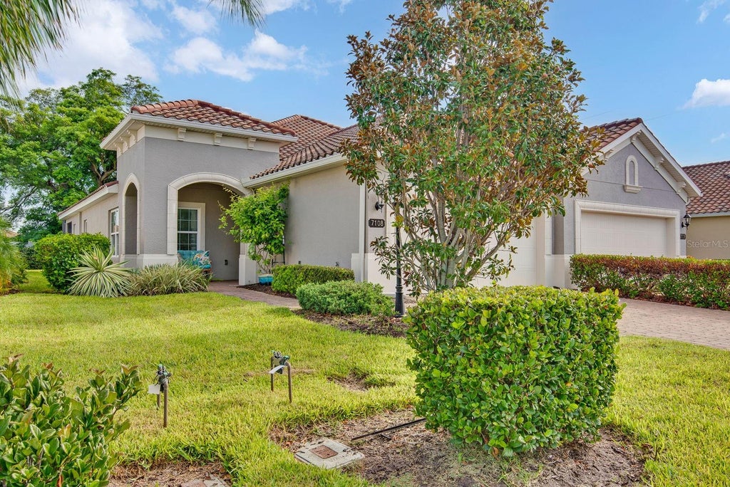 Photo of 7108 Playa Bella Drive, Bradenton, FL 34209 (MLS # A4701842)