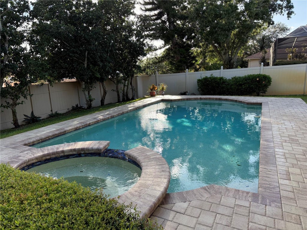 Photo of 13000 Farmington Trail, Seminole, FL 33776 (MLS # TB8559289)