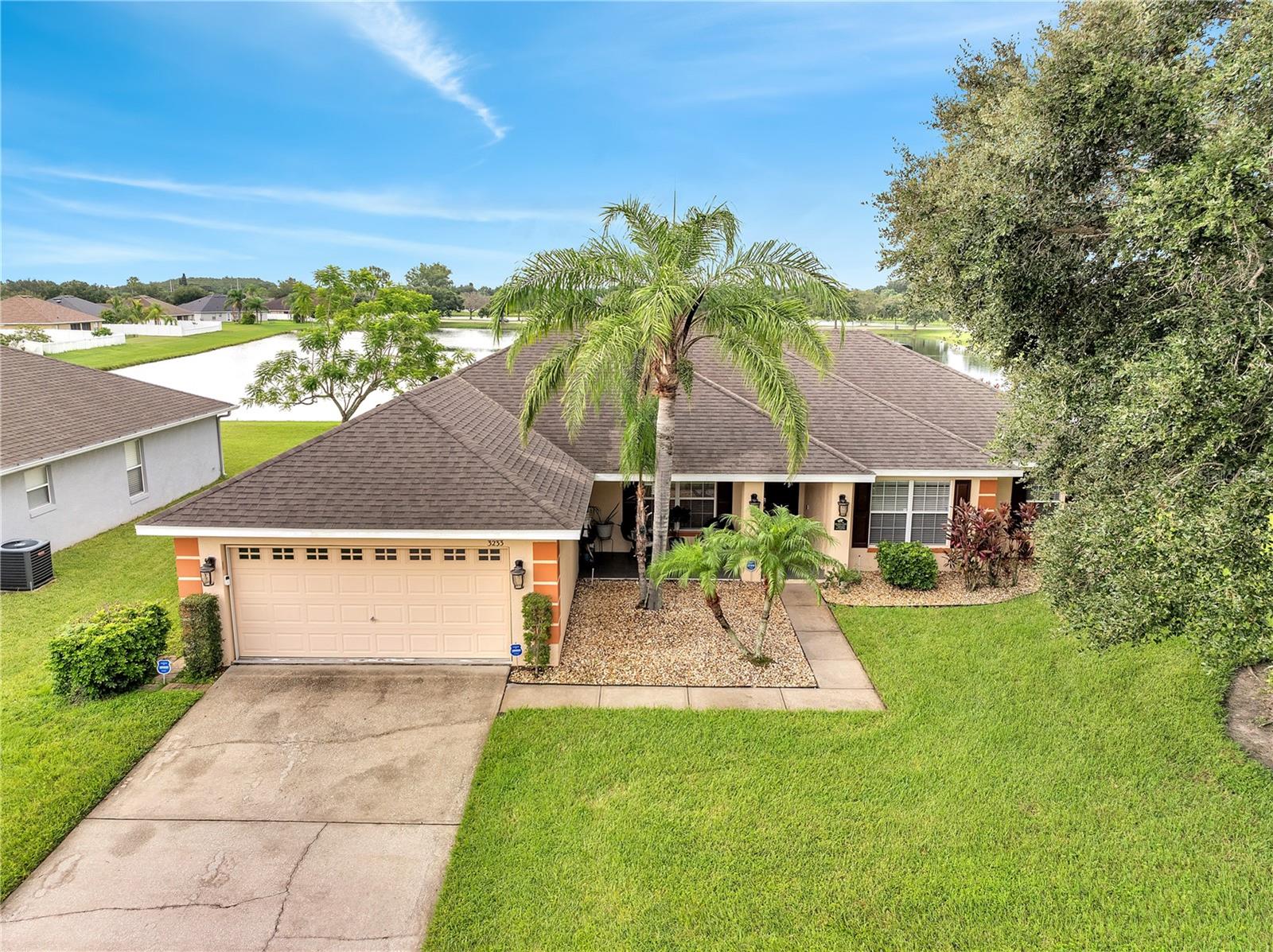 Welcome to this beautifully appointed 4-bedroom, 2-bathroom single-family home in the desirable Keystone Pointe community in St. Cloud, Florida. Spanning 2,279 sq. ft., of living space. Home was recently updated with sophisticated upgrades. Roof was replaced in October of 2017 with architectural shingles. This residence now combines modern convenience with expensive, elegant finishes throughout. Inside, you’ll find white porcelain tile flooring flowing seamlessly through every room, including closets, accented by 5.5” baseboards and light grey walls that create a timeless, refined ambiance. The home offers a formal living and dining room for entertaining, while the kitchen with quartz countertops and backsplash connects to a breakfast bar, dinette, and a spacious family room. The kitchen is enhanced with professionally painted grey cabinets and premium Samsung SmartThings appliances, including a convection oven stove and a stunning three-door French-door glass refrigerator—both Wi-Fi enabled for modern living. The luxurious master suite boasts his-and-her walk-in closets and an en-suite bath with double quartz vanity, garden tub, and separate shower stall. Three additional bedrooms are complemented by a guest bath upgraded with an elegant marble countertop and professional painted grey cabinetry, providing comfort and style for family and visitors alike. Experience serene outdoor living whether relaxing on the covered front patio or enjoying the backyard oasis overlooking a picturesque pond with no rear neighbors. This is an oversize lot with over 11,000 sq ft in size. Additional highlights include a 2-car garage, new Samsung washer and dryer, upgraded lighting and modern fans, water filtration system, alarm, and security cameras. This home radiates natural light through expansive windows, accentuating its sophisticated charm. All designer furniture may be purchased separately, offering a complete turn-key lifestyle experience.
