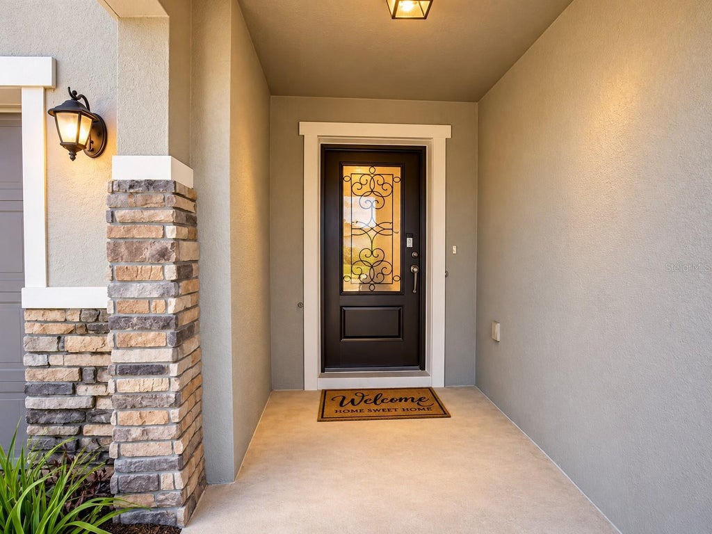 Photo of 605 Sarner Pass Way, Winter Haven, FL 33881 (MLS # G5119191)