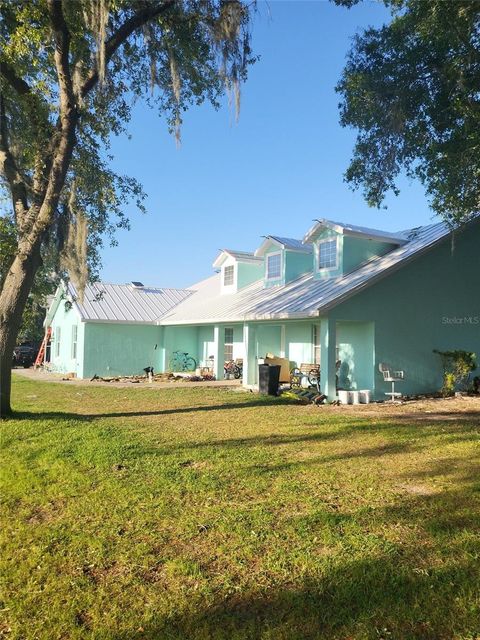Photo of 8780 E Derby Oaks Drive, Floral City, FL 34436 (MLS # TB8501345)