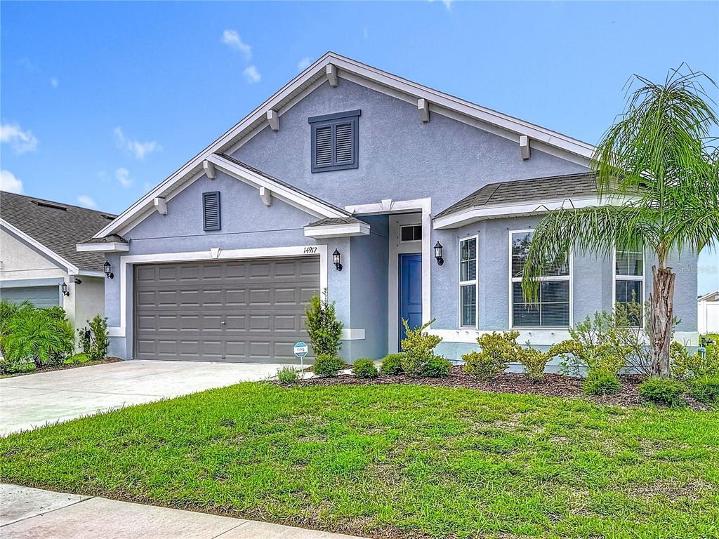 Photo of 14917 Tropical Violet Way, Wimauma, FL 33598 (MLS # O6339689)