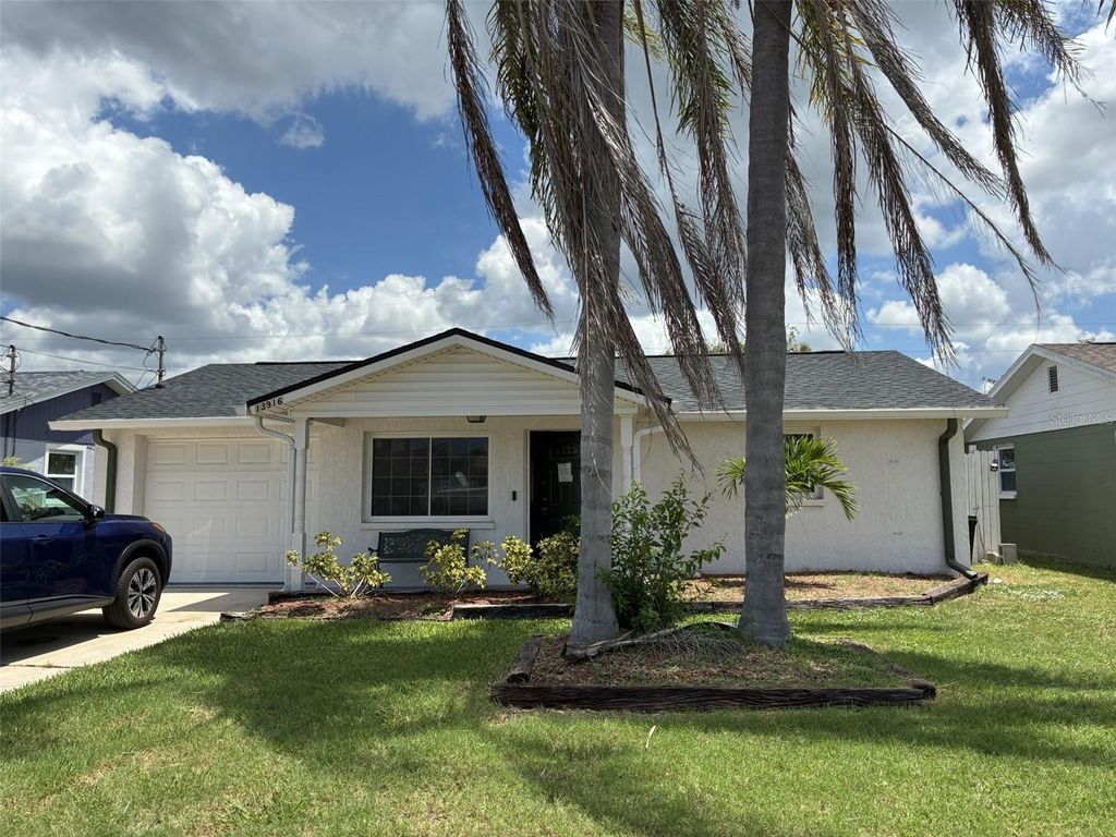 Photo of 13916 Muriel Avenue, Hudson, FL 34667 (MLS # O6338133)