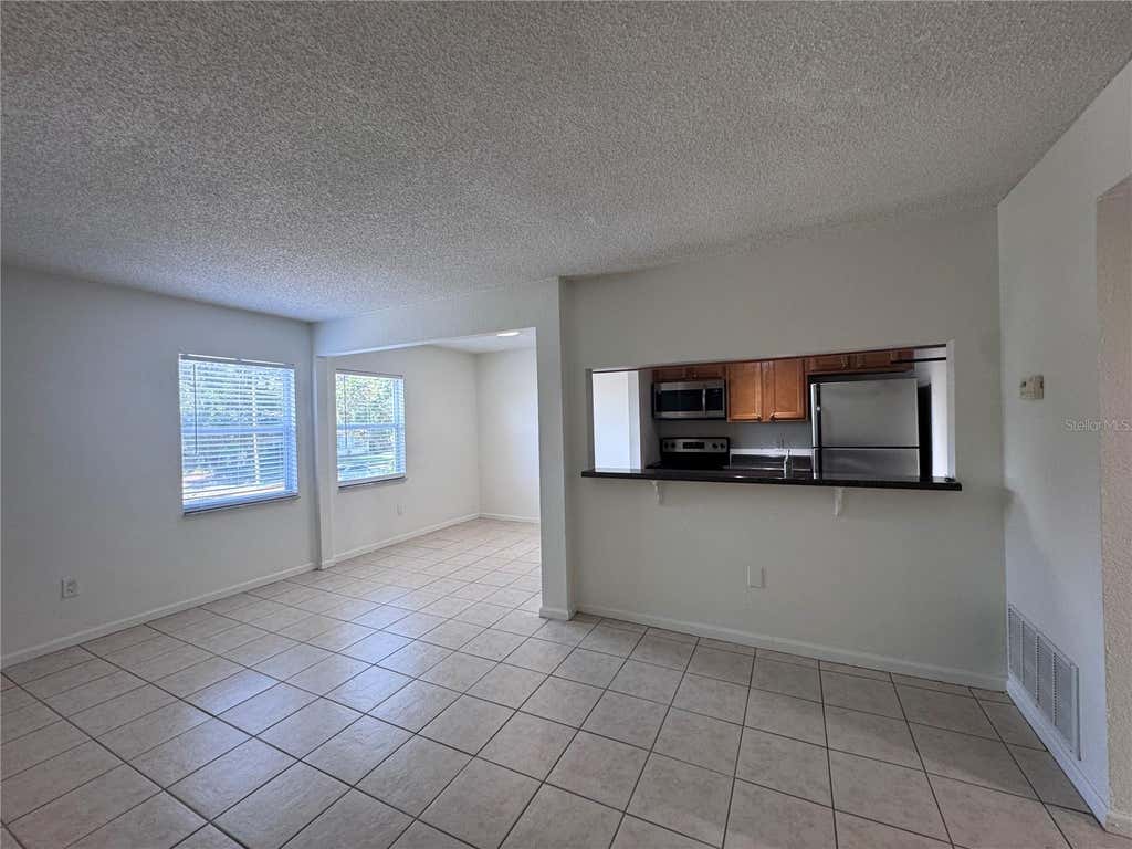Photo of 115 E Smith Street #8, Orlando, FL 32804 (MLS # O6432682)