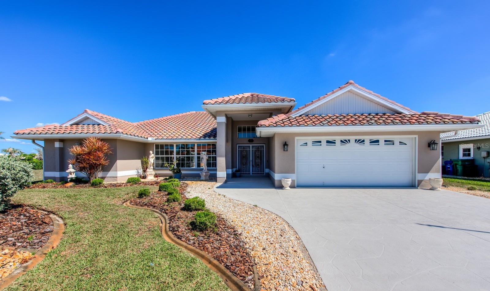 Absolutely Stunning Family Home located in highly sought after Englewood Isles. This is a boating community with boat docks available for rent. Live the Florida Lifestyle!! Home has been recently updated with Luxury Vinyl Plank flooring throughout, New tile in the bathrooms, new interior and exterior paint, Granite countertops in the kitchen and quartzite in the bathrooms. Open floor plan, French doors lead out the caged pool. Pool area has a large covered area to enjoy the Florida weather. This 4 bedroom, 3 bath home has plenty of room for a family to enjoy. Only 5 minutes away to Manasota Beach to dip you toe in the Gulf. Pets are allowed with owner's approval. Lawn and pool maintenance are included as well as Pest Control. Owner may consider a 6-12 month lease or an annual. Call now for your tour. This is a real gem and will not last long!