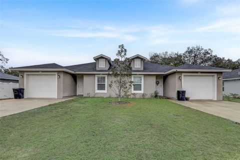 Photo of 5 Rainbow Lane, Palm Coast, FL 32164 (MLS # O6387739)