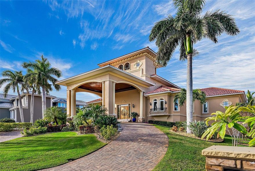 Back ups requested. Welcome to one of the most gorgeous homes in the entire Tampa Bay area. If you are ready to treat yourself to the ultimate in Florida luxury, look no further; you have found your home. One of the things that makes this home so spectacular is its perfect positioning on the island of Tierra Verde, with 143 feet of uninterrupted waterfront and, at night, the sparkling lights of historic Pass-a-Grille in the distance. The home itself is a masterpiece of custom architecture that seamlessly combines contemporary sophistication with timeless elegance. As you arrive at this impressive residence and enter through the elegantly welcoming foyer, you will immediately be drawn to the wide-open water views and grand veranda. The luxury of the French-patterned brushed and chiseled marble floors flow throughout most of this exquisite home. Deep rich crown molding and elegant wide baseboards adorn every room, while walls of glass showcase the views and allow for a seamless transition between inside and outside. With its complete outdoor kitchen, numerous gathering spaces, and stunning Gulf views, the grand veranda is the perfect place to entertain your lucky guests. The great room is punctuated with a fireplace and mantle surrounded by the warmth and beauty of cast stone, rich wood built-ins, display shelves, a niche for a 50 x 30 TV, a handy beverage center, ice maker and an exquisite handmade ceiling accent. The kitchen delights with all Sub-Zero and Wolff appliances, super-sized island, gas cooktop, magnificent hood, touch faucet, handsome custom cabinetry with plenty of drawers and doors, and workspace for several chefs.  The casual dining area has such glorious views no one will want to leave the table. A butler's pantry adjoins the kitchen with an additional dishwasher, sink, additional refrigerator, washer, dryer, and storage. The dining room is stunning with ample seating for many guests, beautiful moldings, and coffered ceilings. There are three comfortable bedrooms on the main floor, each with adjoining bathrooms and custom cabinetry that features designer granite. The luxurious study is breathtaking with its handsome wood floors, 6-piece crown moldings, and built-ins that have bookshelves with doors and drawers that can be locked.  The second story, which can be accessed by an extraordinary staircase or an elevator, is entirely dedicated to the indulgence of the owners.  The space features a peaceful bedroom with an ambiance perfect for relaxing, a sitting room with a fireplace, a TV, a kitchenette, two spacious custom walk-in closets, and a washer and dryer for your convenience. The primary bathroom is absolutely stunning with a freestanding Amiata bathtub and walk-through shower. Every cabinet, mirror, knob, pull, towel rack, and shower fixture has been carefully selected to perfection to ensure a seamless and elegant look. The top-level deck overlooking the Gulf of  Mexico can be accessed by elevator or stairs. This is the ultimate place for stargazing, yoga, or meditation. There is no other place like Tierra Verde! It is a peaceful subtropical island yet enjoys quick access to Highway 275, for fast arrival at TPA, and PIE, and quickly delivers you to the doorstep of all the benefits of a major metropolitan area:cultural,medical,educational, world-class shopping, and major league sports. Bedroom Closet Type: Walk-in Closet (Primary Bedroom).