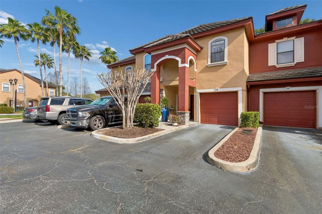 Photo of 2261 Tuscany Trace #102, Palm Harbor, FL 34683 (MLS # TB8486130)