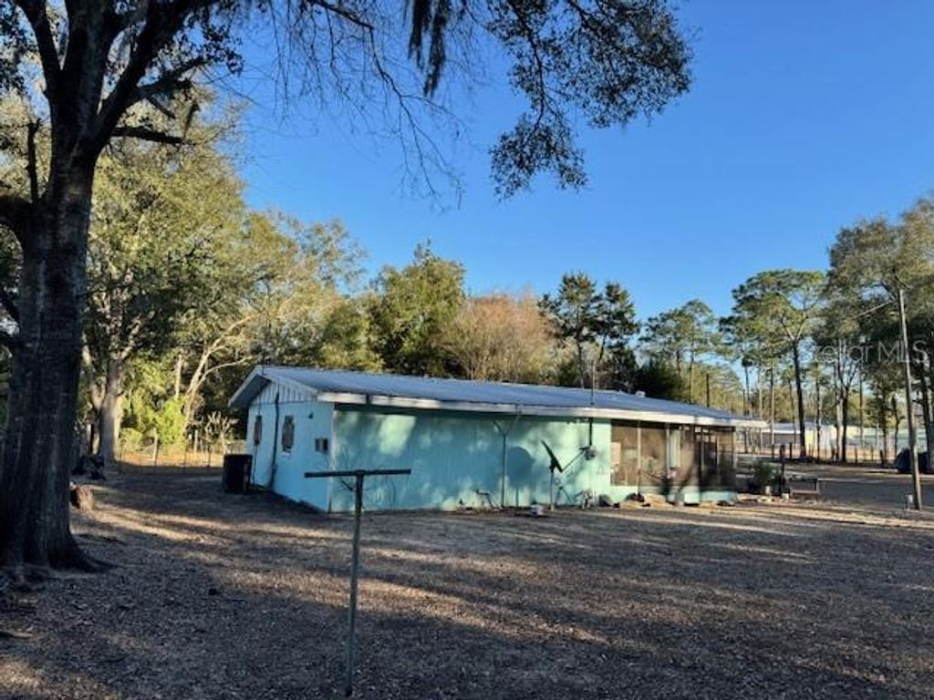 Photo of 5710 NE 140th Court, Williston, FL 32696 (MLS # W7882696)