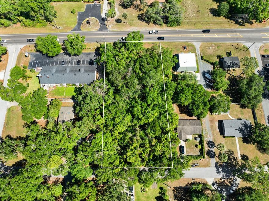 Rare opportunity to own 0.80 acres of commercially zoned land in the rapidly growing Sorrento-Mount Plymouth area. This property consists of two lots with access from both Sorrento Avenue, the main thoroughfare through town, and Colmar Avenue at the rear—both paved roads. Located within the Sorrento-Mount Plymouth Community Redevelopment Area (CRA), this raw land is one of the few remaining commercial parcels available in the area. Just minutes from the 429 and 453 State Toll Roads, with convenient access to 417 and I-4, the property offers excellent visibility and flexibility for a variety of permitted commercial uses. The adjacent property is also available (MLS# G5095839) and includes a 2-bedroom, 1-bath home with residential use and commercial zoning, providing additional possibilities.