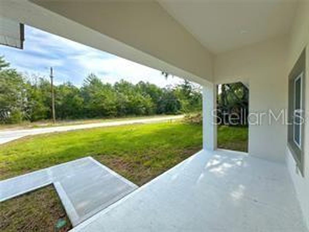 Photo of 2382 W Paragon Ln, Citrus Springs, FL 34434 (MLS # O6385352)
