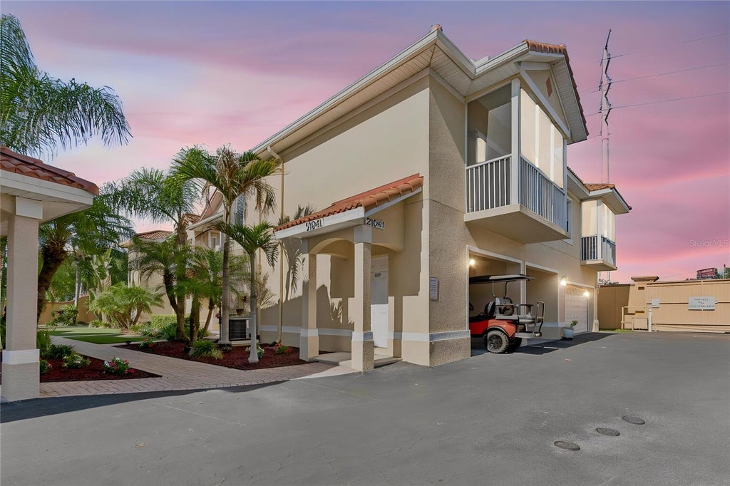 Photo of 21041 Sunpoint Way #201, Lutz, FL 33558 (MLS # TB8521805)