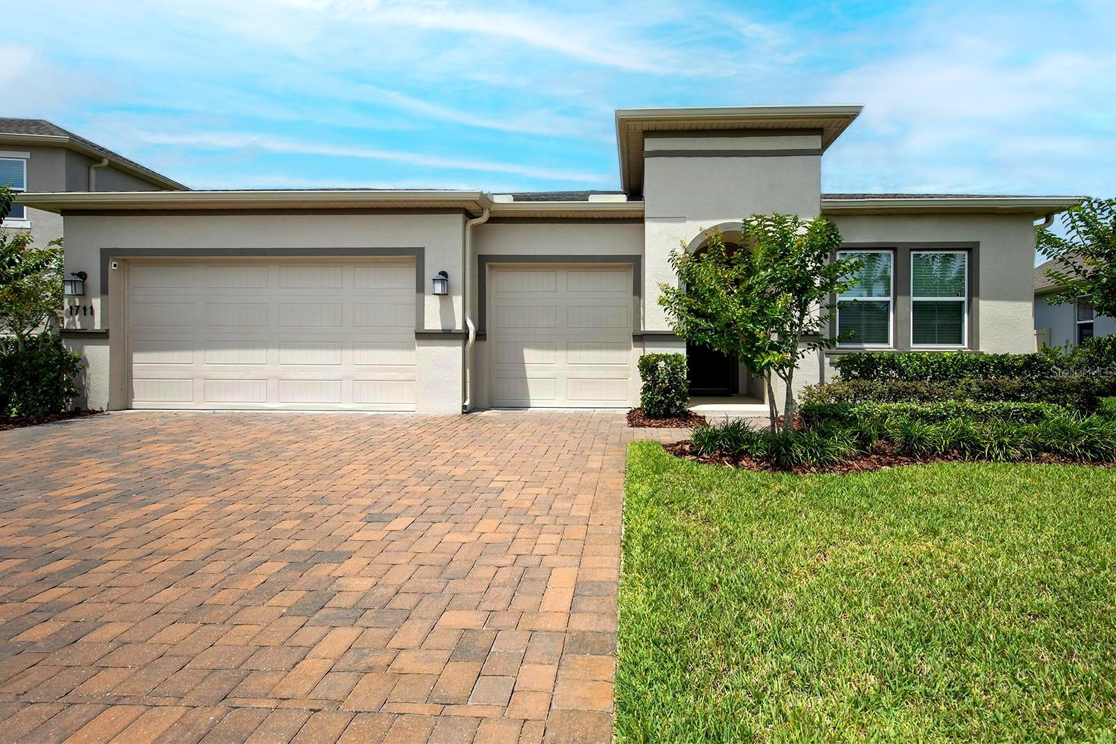 Step into this stunning 4-bedroom, 3-bathroom smart home nestled in the sought-after gated community of Arden Park North. With over 2,500 sq. ft. of thoughtfully designed living space, this home blends modern luxury with everyday comfort, creating the perfect sanctuary for your family.
The popular Estero floor plan offers a spacious open layout, ideal for both entertaining and relaxing. French doors open to a fenced-in backyard—one of the largest in the neighborhood —featuring an extended paver patio and a screened-in lanai perfect for outdoor gatherings.
This home is equipped with state-of-the-art smart home technology, allowing app-controlled access to lighting, thermostat, irrigation, garage, and front door security. Additional upgrades include solar panels, whole-home water softener, drinking water filtration system, and fans throughout.
Located just steps from the scenic West Orange Trail, this vibrant community is ideal for biking, jogging, or peaceful strolls. Enjoy resort-style amenities such as a community pool, fitness center, clubhouse, multiple parks, and a walking path around a picturesque lake.
From sustainability to smart living, this home has it all. Don’t miss your chance to own a beautiful residence in one of the area’s most desirable communities.
Schedule your private tour today and experience the elevated lifestyle that awaits in Arden Park North!