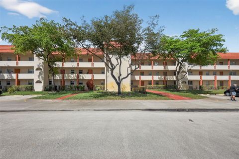 Photo of 8051 N Sunrise Lakes Drive #307, Sunrise, FL 33322 (MLS # O6392675)
