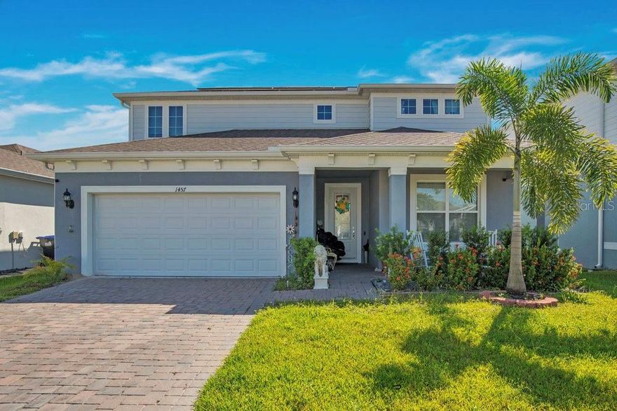 Welcome to this stunning and modern residence at 1457 Grand Palm Drive in the highly desirable Savannah Palms community of Alafaya, Orlando, Florida 32828. Built in 2023 by Pulte Homes, this beautifully maintained home offers approximately 3,464 square feet of thoughtfully designed living space featuring 5 bedrooms and 4.5–5 bathrooms.
It stands out with the rare convenience of primary bedrooms on both the ground floor and upstairs, providing excellent flexibility for main-level living, multi-generational households, or guests. The solar panels (to be paid off at closing) deliver significant savings on electricity with an average electric bill of $38/month, while additional highlights include a 3-car epoxy-coated garage, whole-house water softener, and designer finishes throughout.
This fairly new home has been exceptionally well cared for and presents in pristine, move-in ready condition with an open-concept layout perfect for today's lifestyle and entertaining. Located just minutes from shopping, dining, top-rated schools, the University of Central Florida, Orlando International Airport, Waterford Lakes, and Avalon Park, it offers unbeatable convenience and easy access to beaches and major highways.
A true gem in one of East Orlando’s most sought-after communities, this energy-efficient home combines luxury, practicality, and low-maintenance living—ideal for families and professionals alike.