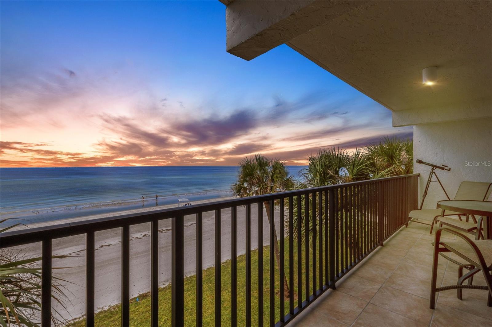 Welcome to your own personal coastal retreat at Portobello on Longboat Key. This exquisitely furnished 2-bedroom beachfront condo spans 1,260 square feet, offering beautiful, serene Gulf views from both bedrooms and the living room. The living area seamlessly flows into a private outdoor terrace space, perfect for savoring morning coffee or breathtaking evening sunsets with the gentle sound of waves as your backdrop. The kitchen and breakfast bar provide suitability and culinary creativity, while the in-unit washer and dryer add convenience to your daily routine. Retreat to the primary suite, a tranquil haven with ample closet space and an en-suite bathroom. Also, a BRAND NEW hot water heater AND AC unit were installed 2025! Step out through the sliders onto the terrace and enjoy the view. The second bedroom provides the same luxury. Spend days basking in the sunlight and nights gazing at the stars. This exclusive residence offers an array of amenities to enhance your lifestyle. Enjoy the heated pool or take advantage of the boat dock and fishing pier for leisurely days on the water. With beachfront access, every day feels like a vacation. The property also features an elevator for ease of access and includes assigned parking for your convenience. There is also a clubhouse, tennis courts, kayak storage, and an outdoor grilling area to enjoy when you are not at the beach. Embrace the luxury of waterfront living in a community that values tranquility and elegance. Located mid-key and close to shops, restaurants, golf courses, Publix, the world renown St. Armand's Circle and downtown Sarasota, there is so much to encounter and explore while you are here. Experience the essence of coastal sophistication in this Longboat Key gem. Don't miss this opportunity to own your piece of Paradise!