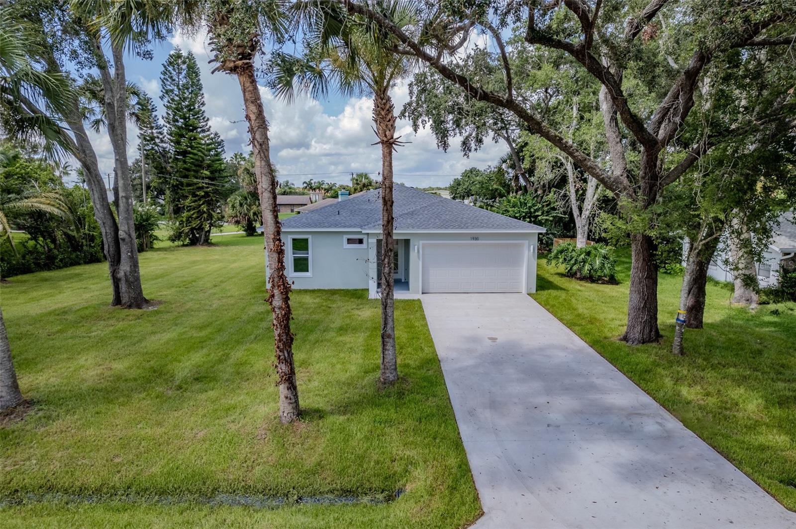 Welcome to this exceptional home, set on a rare 120-foot-wide by 125-foot-deep .34 acre lot. This modern three-bedroom, two-and-a-half-bath residence, built by luxury coastal builder Maier James, offers an open-concept layout with guest bedrooms thoughtfully placed at the front of the home to ensure privacy for all.
Designed with both efficiency and safety in mind, the property features a hip roof to help reduce insurance costs and PGT hurricane-impact windows for added protection. High-end finishes include quartz countertops, luxury vinyl plank flooring throughout, custom tile in the master and guest bathrooms, energy-efficient LED lighting, push-button illuminated vanity mirrors, and sleek, natural wood-toned cabinetry.
This home is more than just a residence—it's a work of art. From the moment you arrive, you'll appreciate the versatility and extra space provided by the oversized lot.
