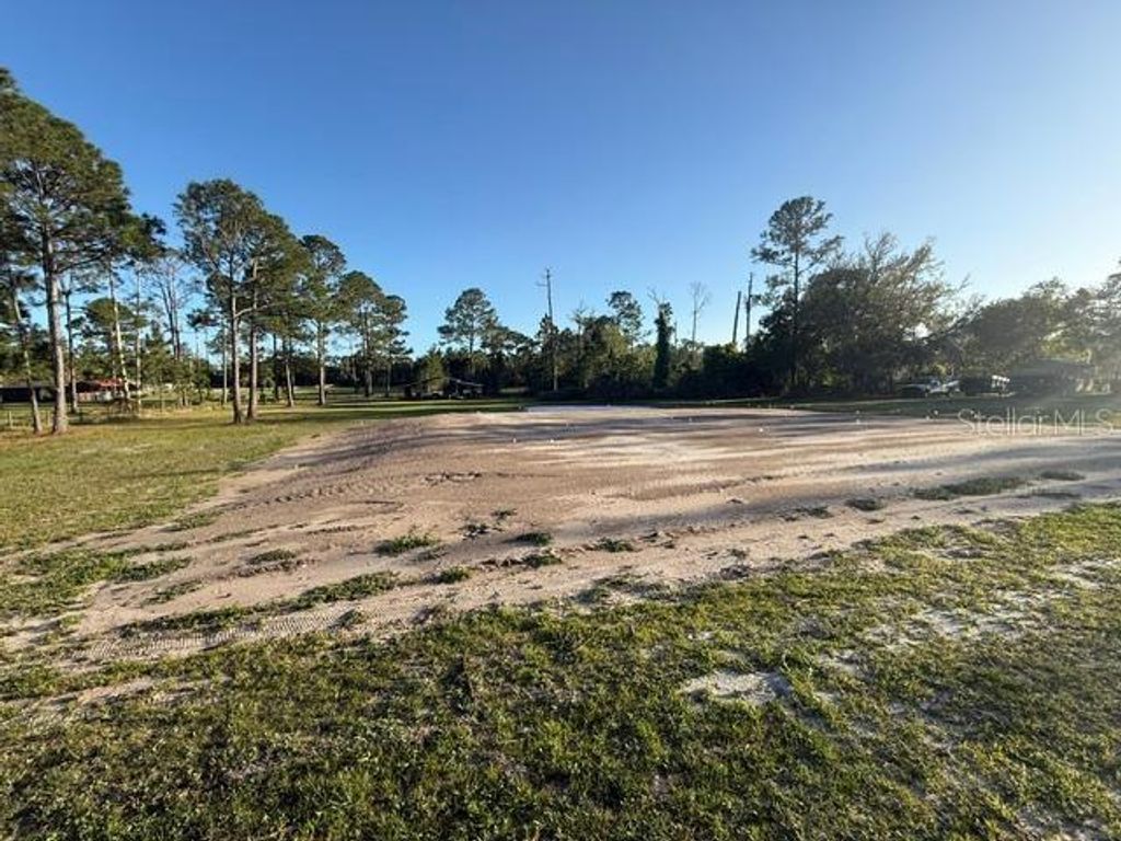 Photo of 110 Wild Horse Run, Deltona, FL 32738 (MLS # O6396345)