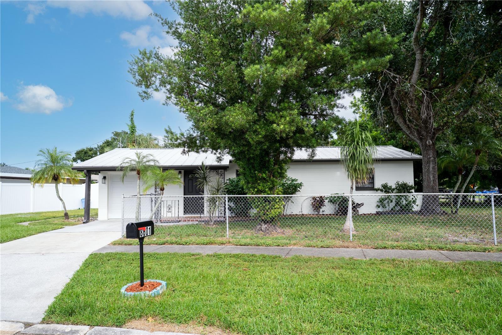 This beautifully updated 2 bedroom, 1 bathroom, 1 car garage home in Pinellas Park is move-in ready and full of modern charm. Featuring new interior and exterior paint, new lighting, new LVP flooring, a brand-new bathroom, and a completely updated kitchen with an island, stone countertops, stainless steel appliances, subway tile backsplash, recessed lighting, and plenty of cabinet space, this home truly has it all. The open-concept living room and kitchen create a welcoming flow, while the separate dining room offers flexibility as an additional living or family room. Sitting on an oversized .17-acre corner lot with a fenced backyard, plus a roof from 2017, this home is both stylish and practical. Centrally located near parks, beaches, shopping, dining, and entertainment, this property is a fantastic opportunity—schedule your showing today!