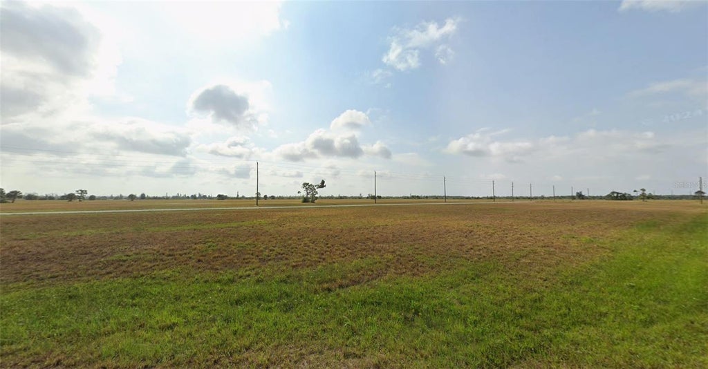 Photo of 34 Cockatiel Way, Placida, FL 33946 (MLS # O6453739)