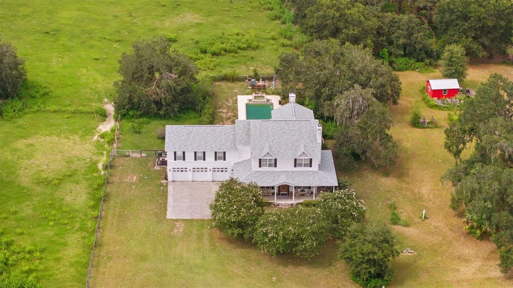 Photo of 13621 Mcintosh Road, Thonotosassa, FL 33592 (MLS # TB8516271)