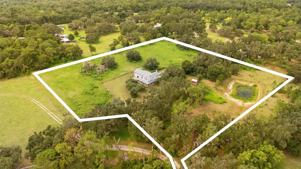 Photo of 13621 Mcintosh Road, Thonotosassa, FL 33592 (MLS # TB8516271)
