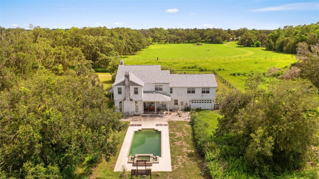 Photo of 13621 Mcintosh Road, Thonotosassa, FL 33592 (MLS # TB8516271)