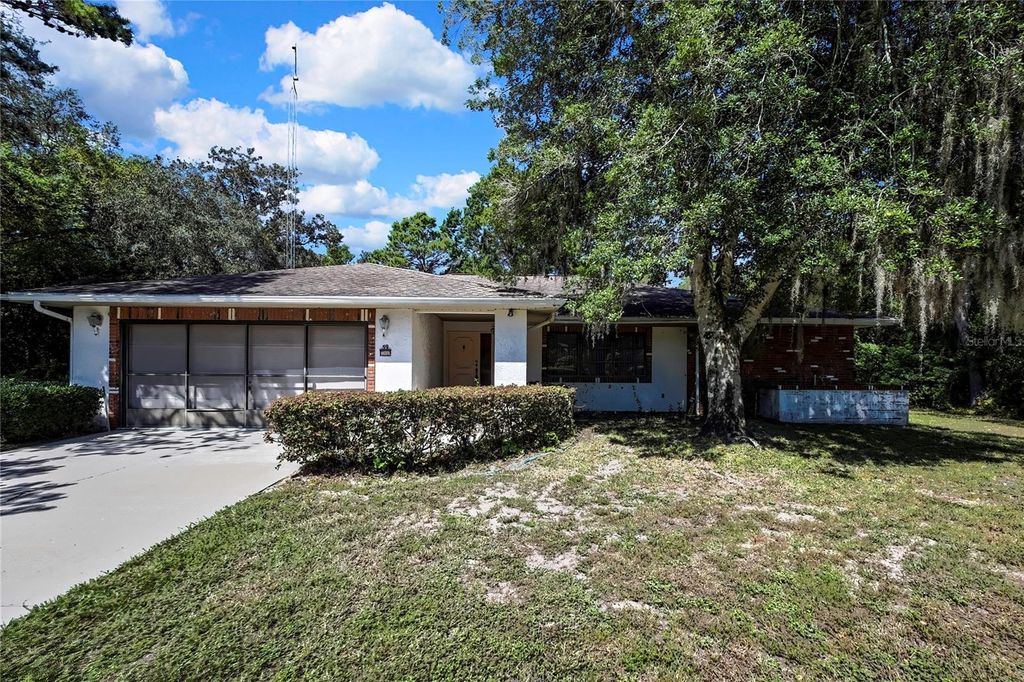 Photo of 59 Oak Village Boulevard, Homosassa, FL 34446 (MLS # TB8434641)