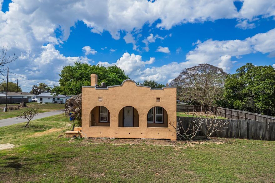 Discover the charm and potential of this updated Spanish-style home at 311 W Pearce Avenue in Eagle Lake. Situated on a large fenced corner lot, this property is full of character and offers a great opportunity for a first-time buyer or investor. Inside, the open and spacious living and dining areas feature wood flooring, crown molding, and abundant natural light, creating a warm and inviting feel. The kitchen offers ceramic tile flooring, solid wood cabinetry, and original built-ins that add timeless appeal. The primary bedroom features carpet, while the additional bedrooms showcase wood floors. The bathroom includes a large walk-in ceramic tile shower. Enjoy relaxing on the spacious covered front porch, and appreciate key updates including a 2019 roof, 2017 A/C, 2016 electrical wiring, water softner and 2019 water heater. The laundry room is conveniently located off the back porch. Just three blocks from Eagle Lake and close to two community parks, this home does need a little TLC, but the upside is clear—whether you’re looking for a charming starter home or a solid rental investment.