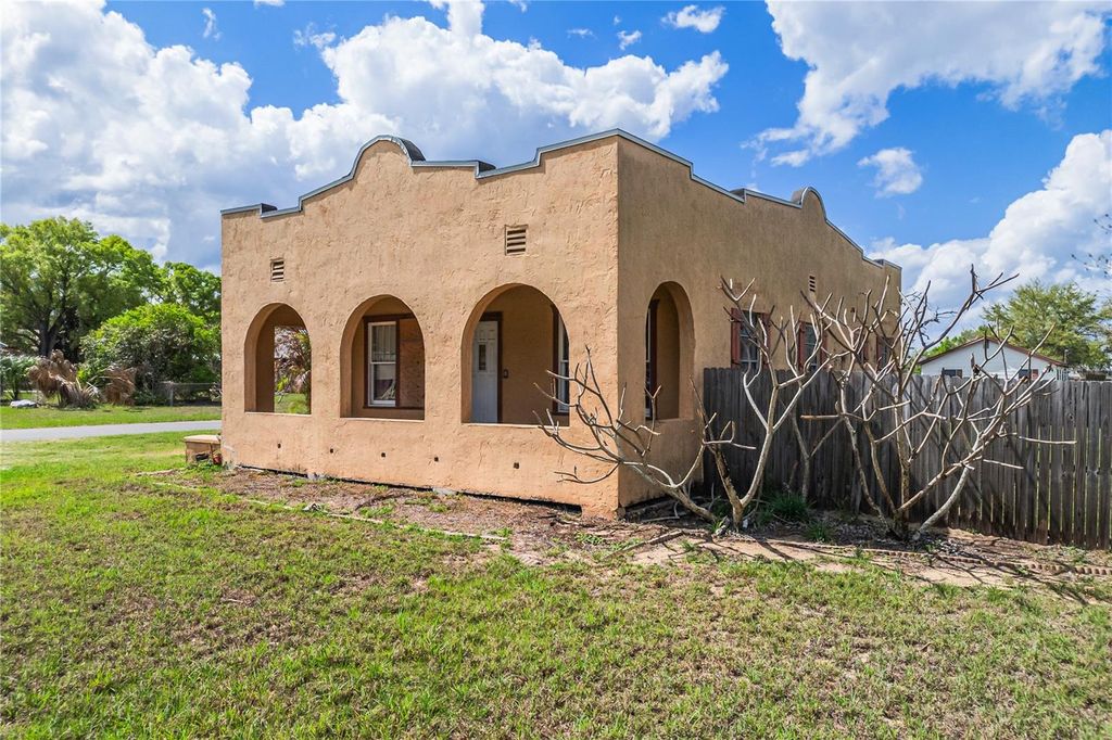 Photo of 311 W Pearce Avenue, Eagle Lake, FL 33839 (MLS # O6390985)